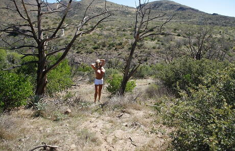 Adorable american blond wife Sandra Otterson exhibits big tits and hot butt outdoor